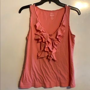 A coral pink tank top with ruffles